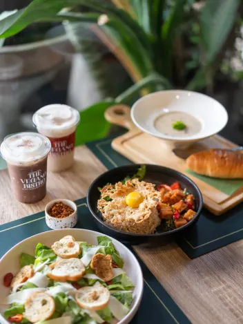 Stylized cafe photography featuring vegan soup and pastry for menu and instagram content
